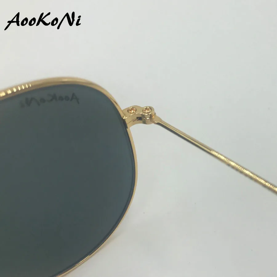 Goedkoop AooKoNi 2019 Nieuwe Luchtvaart Zwart Glas lens Zonnebril Merk Mannen Ontwerp zonnebril UV400 Bescherming Metalen Rijden Oculos eyewer