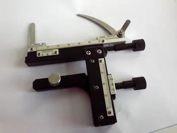 

Brand new graduated mechanical stage attachment for standard slides fitting compound microscopes with two locating pins