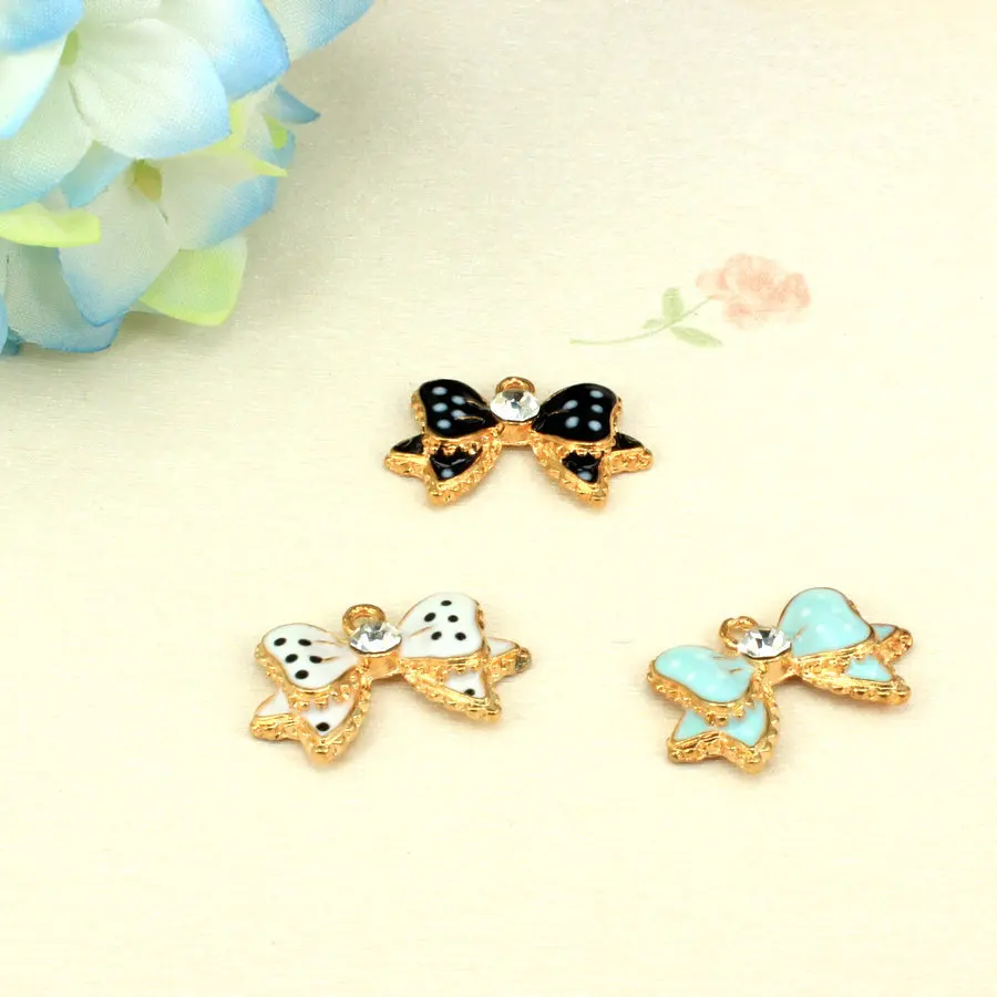

20pcs/lot Fashion Beautiful Gold Color Tone Spot Bow Tie Diy Pendants Charms Oil Drop Metal Alloy Bracelet Charm