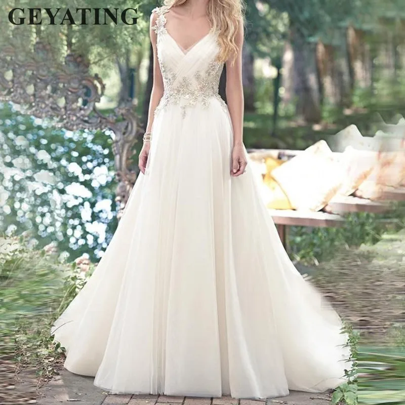 

Ivory Boho Wedding Dresses 2019 Vestido De Noiva Casamento A Line V-neck Lace Appliques Wedding Dress Bead Backless Bridal Gowns