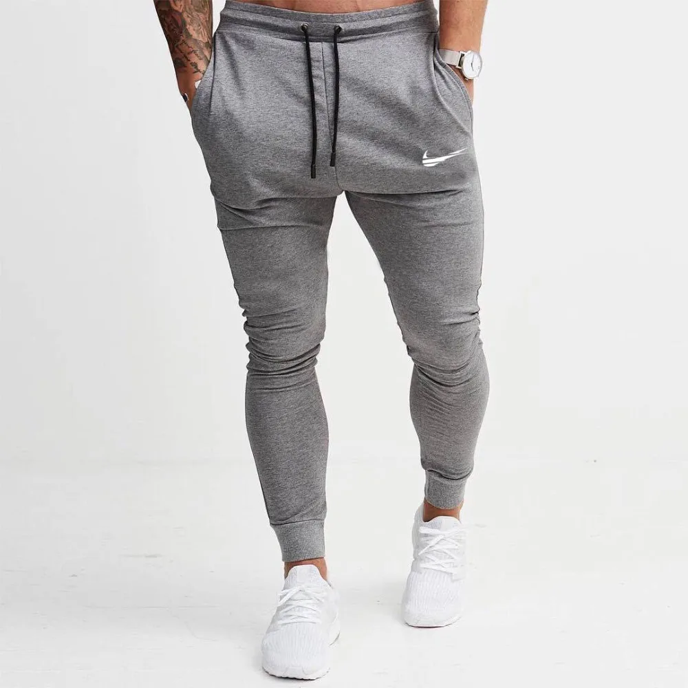 

2019 New Men Joggers Brand Male Trousers Casual Pants Sweatpants Men Gym Muscle Cotton Fitness Workout hip hop Elastic Pants