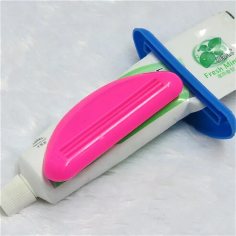 

1PCS Squeeze Tube Rolling Holder Device Squeeze Toothpaste Out Lotions Cosmetics Avoid Wasting ABS New