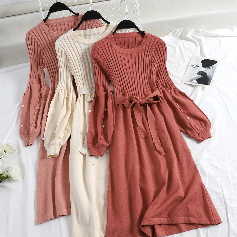 

2018 winter new female O-neck beading lantern sleeve knitted bottoming dresses women solid color elegant A-line sweater dress