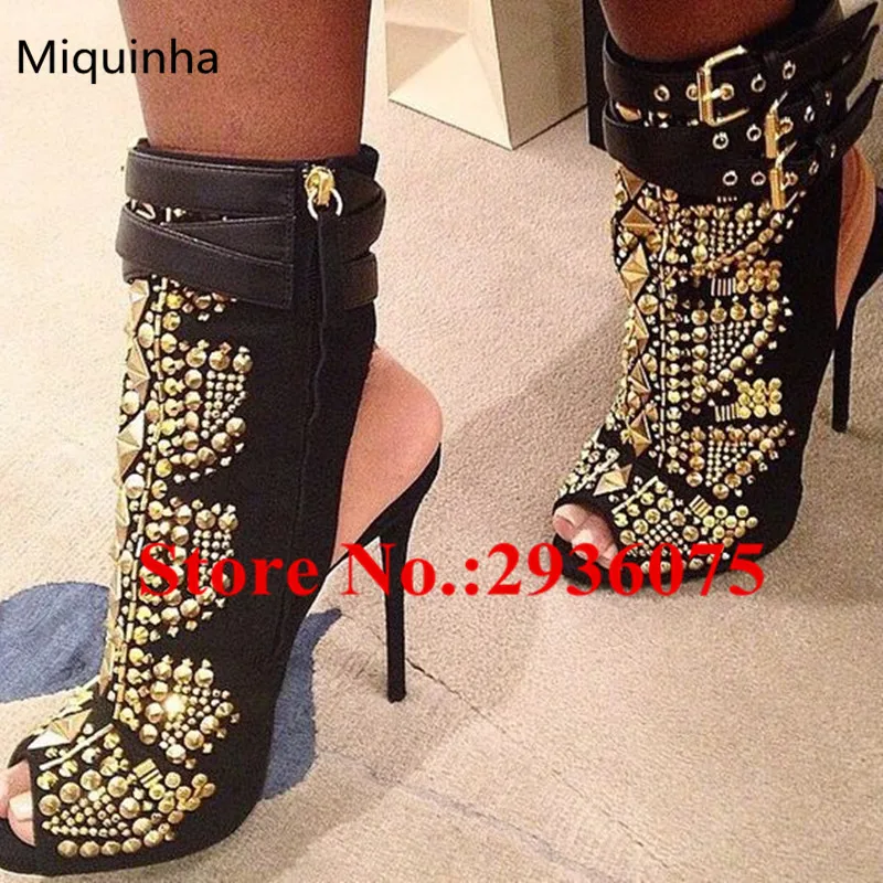 gold studded black ankle boots