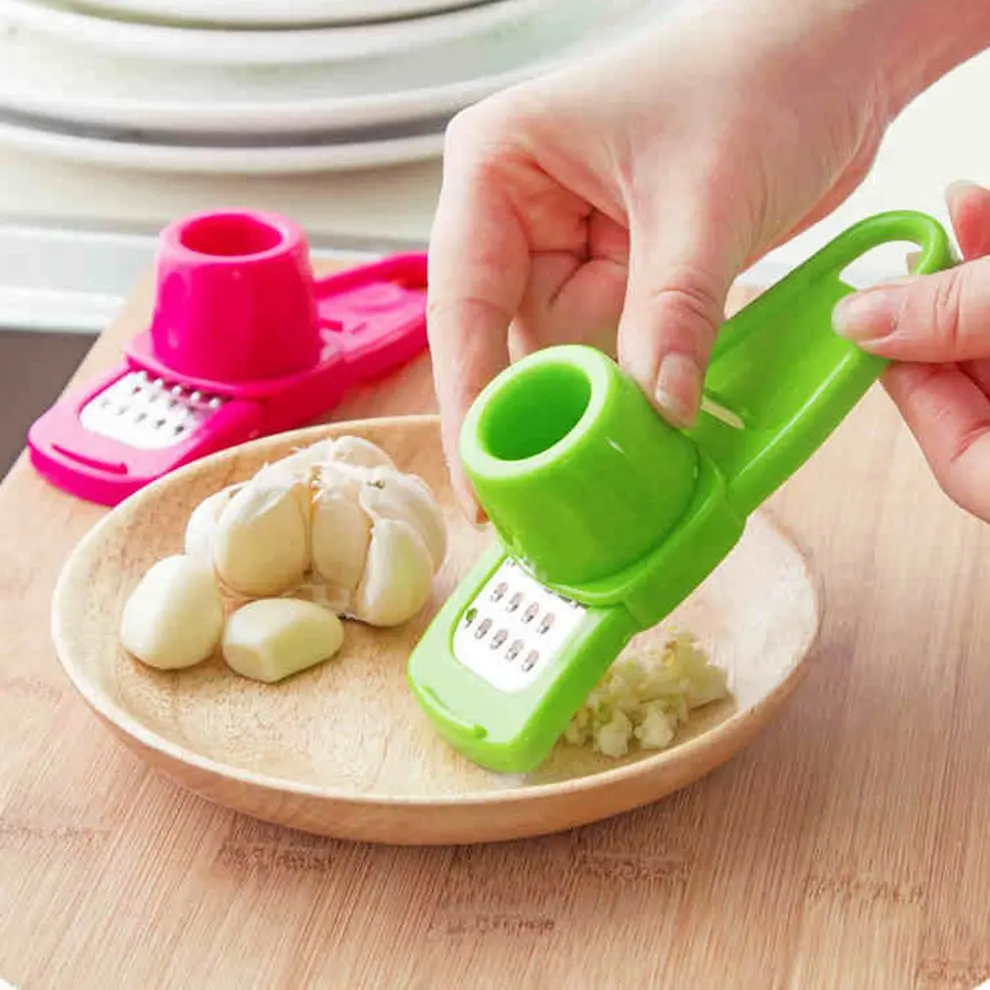 

Hot Search Multi-Function Ginger Garlic Grinding Slicer Mini Vegetable Cutter for Kitchen Creative Tool
