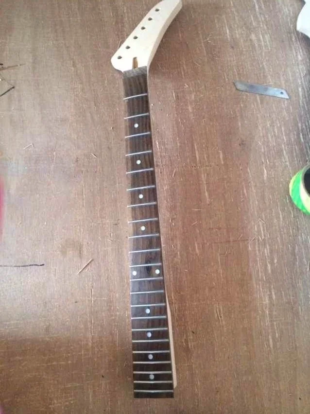 

One piece of banana shape electric guitar neck