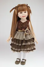 Muñeca reborn con vestido marrón