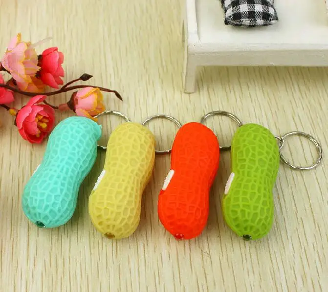 

New 2017 Fashion 1 PC Simulation Illuminated Peanut Keychain Plastic Led Multicolor Random Color Sent Free Shipping