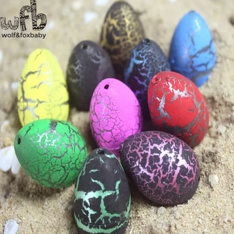 

60pcs/lot 3*2cm creative toys Aquatic kids toy water expansion toy large dinosaur Easter eggs growth Children gift coloful