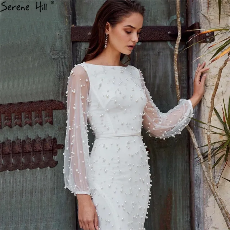 

White Long Sleeve Pearls Mermaid Prom Dresses Design 2019 Dubai O-Neck Sexy Tulle Prom Gowns Serene Hill BLA60995