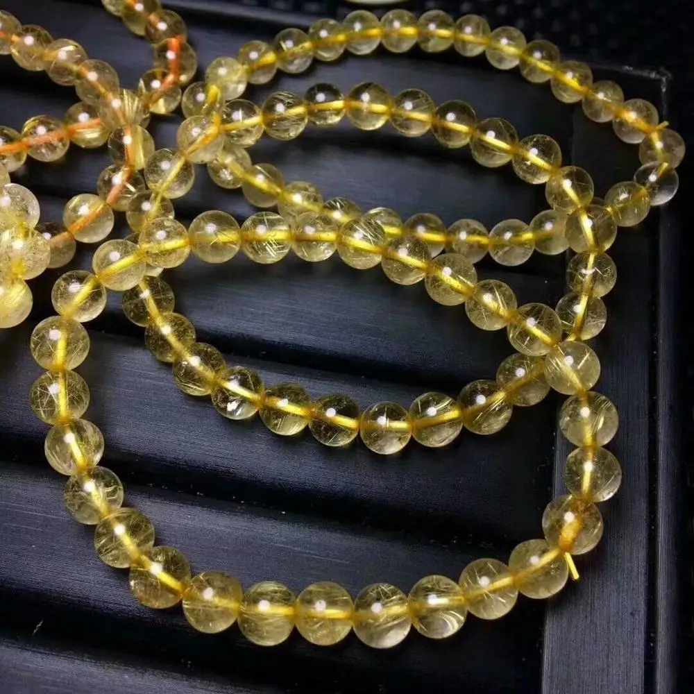 

FREE SHIPPING Natural Brazil Gold Hair Rutilated Quartz Beads Bracelet 7-6.5mm AAA
