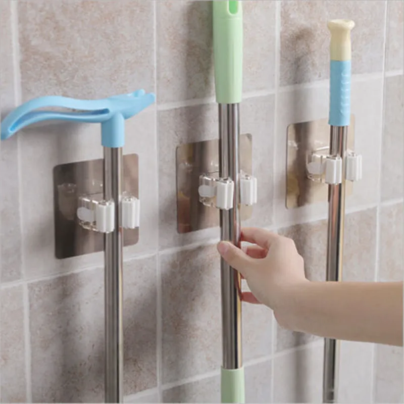 

New Home Self-Adhesive Broom Mop Holder Reusable Rack Wall Suction Clip Hooks A good helper in the bathroom
