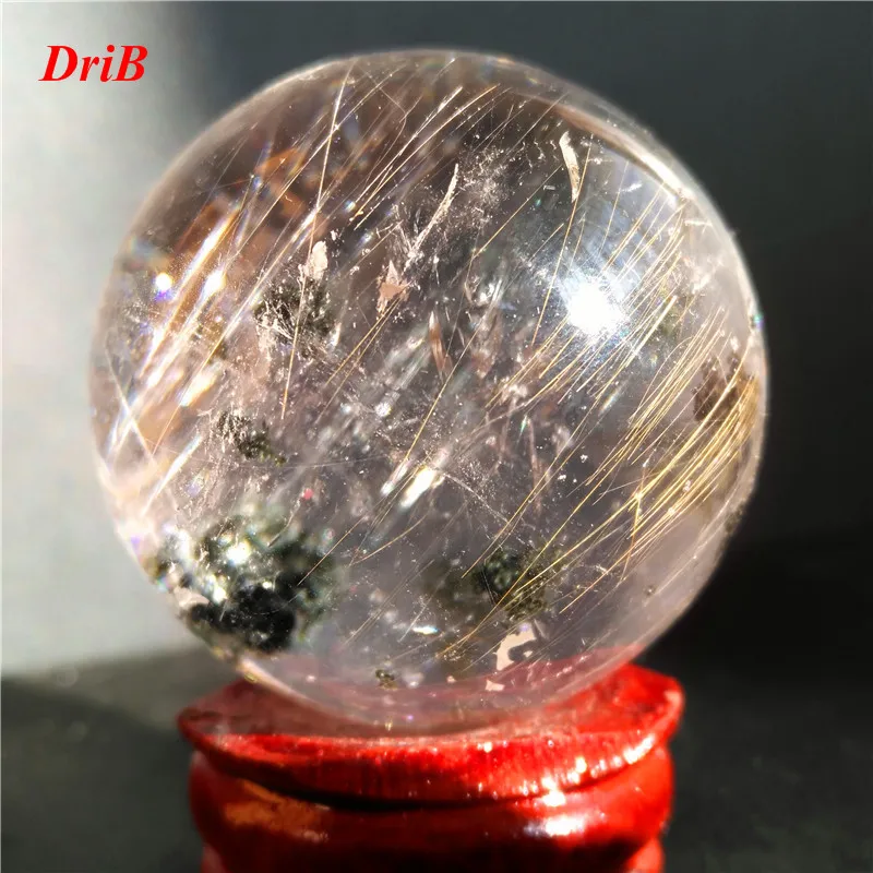 

Natural rutilated quartz crystal ball
