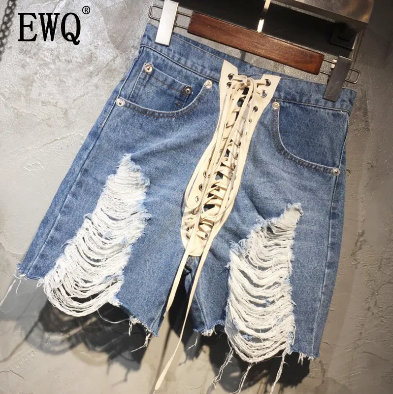 

[EWQ] 2019 Summer New Fashion Clothes Denim Pants Ripped Lace Up High Quality Trend Women Hole Irregular Knee Length Pants QJ458
