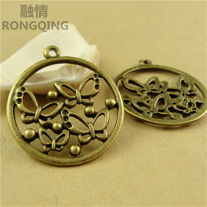 RONGQING 40 шт./упак. Jewelry интимные Аксессуары Круглый животные бабочка талисманы для изготовления ювелирных изделий новый 2019