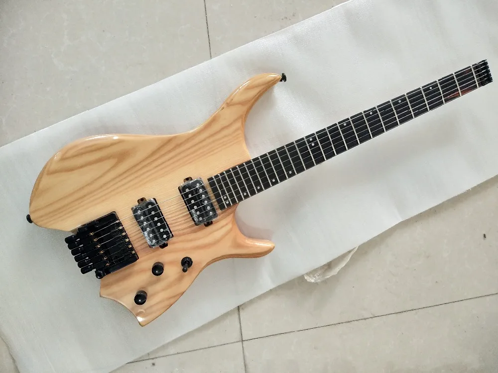 

Factory direct sales of raw wood color headless electric guitar double white wax wood pickups can be customized