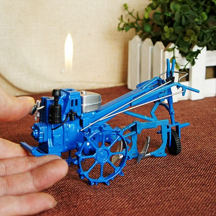 

The new agricultural tractor ploughing model excavator driver gift lighters,Craft gift. Decorative metal lighters