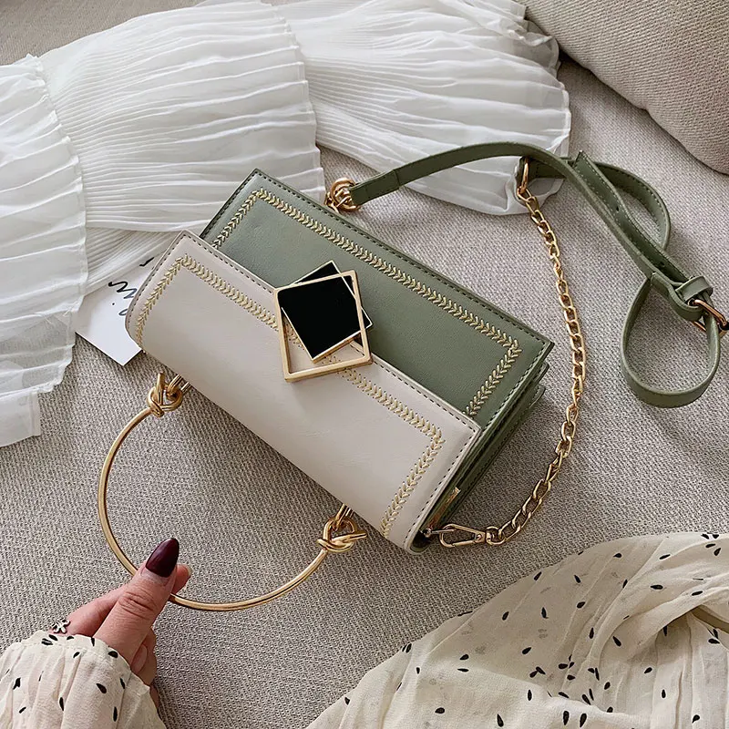 

and fresh. The new Korean version of handheld handbags in 2009 is fashionable, colliding with color and oblique bags.