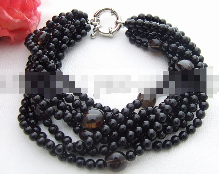 

09502 8Strds Onyx&Smoky Quartz Bracelet