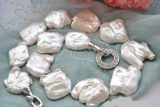 

Wholesale free shipping > HUGE 18" 35mm WHITE BAROQUE KESHI REBORN PEARL NECKLACE