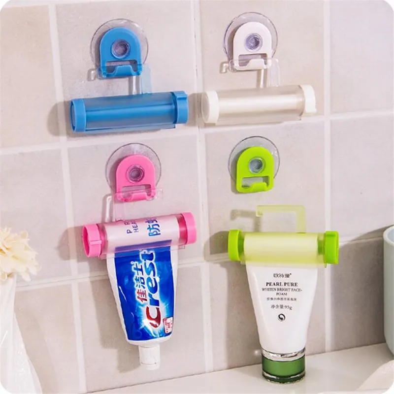 

1 PCS Creative Rolling Squeezer Toothpaste Dispenser Tube Partner Sucker Hanging Holde distributeur dentifrice