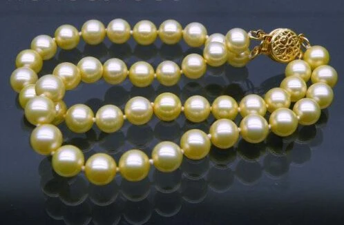 

FREE shipping>>>> 2STD AAA+ round 6.5-7mm golden yellow south sea pearl bracelet 14KGP 8" 6.05