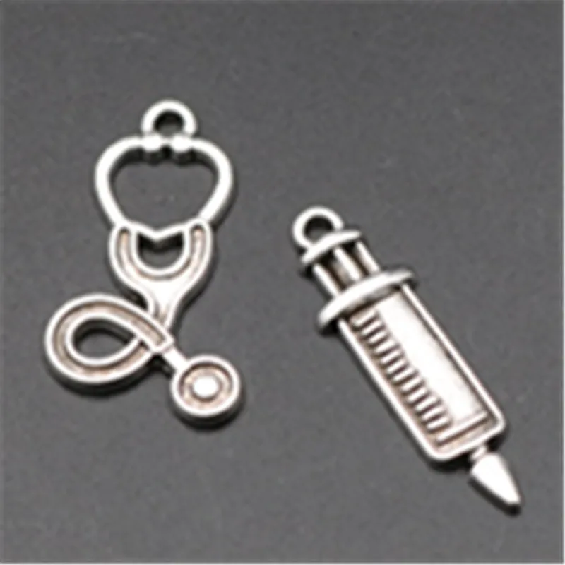 

10pcs Antique silver doctor to give patients the best exhortations syringes and stethoscope series alloy pendants A676