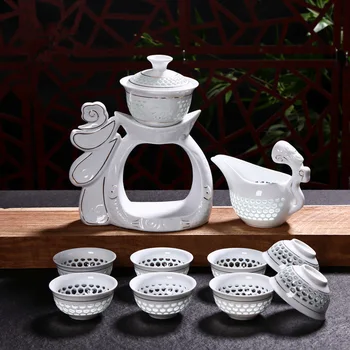 

2018 New Porcelain Dehua Kung Fu Tea Set Cups Automatic White Ceramic Hollow Transparent Blue and White Gaiwan Tea Pot Cup Sets