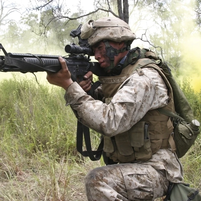 Rifleman fires his M16A-4 Service Rifle Poster Print (16 x 11)