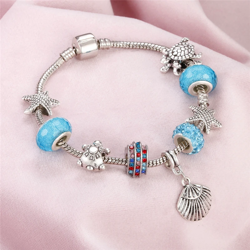 

Ocean Shell Charm Bracelet Blue Beads Heart Lock Crown Heart Pendant Sliver Chain Cuff Bracelets For Women Fashion Jewelry Gifts