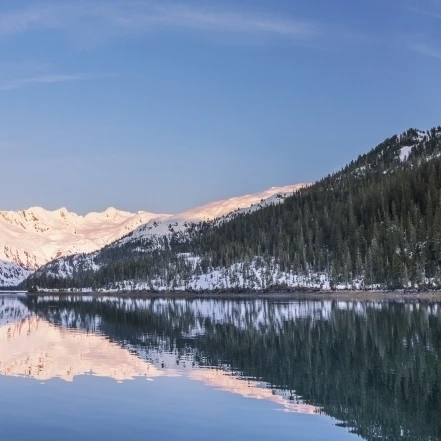 Snowy scenic reflected in the waters of Harrison Lagoon at sunrise  Port Wells