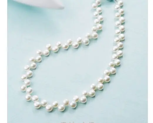 

18" NATURAL SOUTH SEA WHITE PEARL NECKLACE