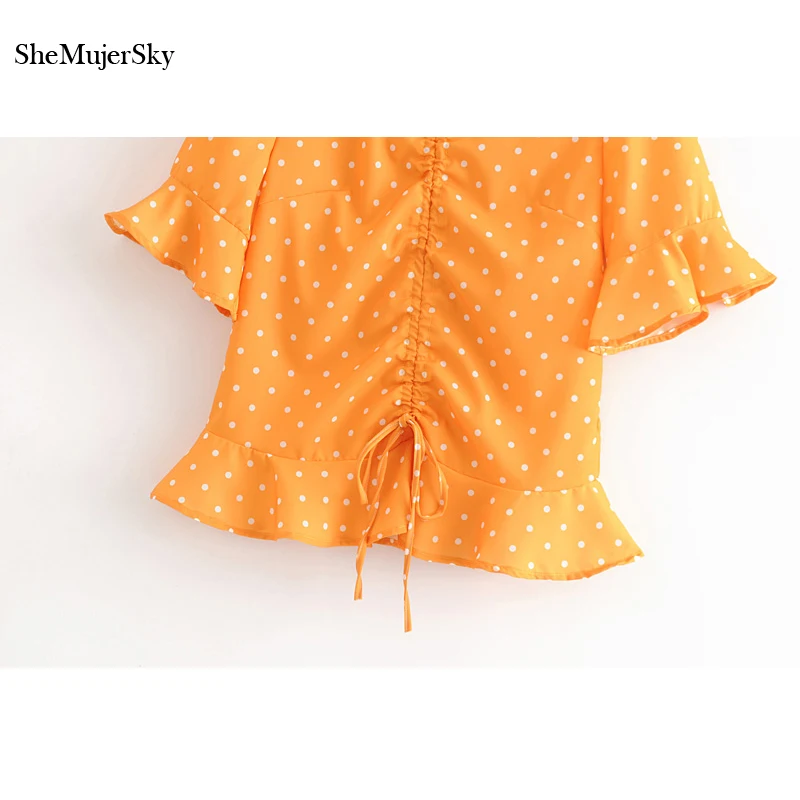 orange polka dot blouse