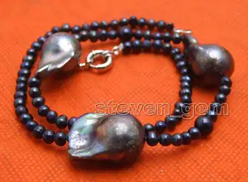 

Big 14*25mm Black Baroque Nuclear pearl & 3-4mm Coral 18'' Necklace