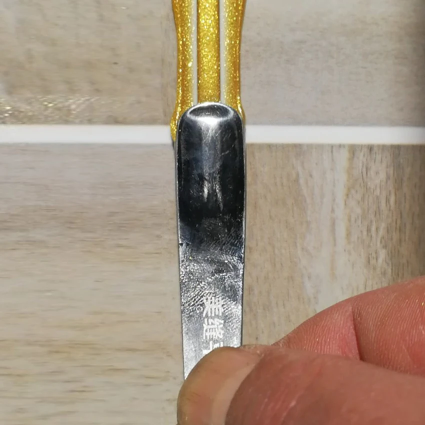 Рисунок 3 - Угловая лопатка Инь Янь из нержавеющей