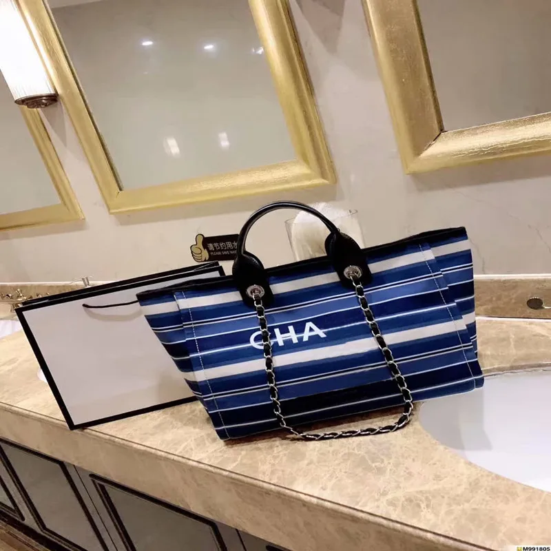 

Women's large capacity regular tote bag 2019 spring and autumn new canvas stripes color matching holiday shopping beach handbags