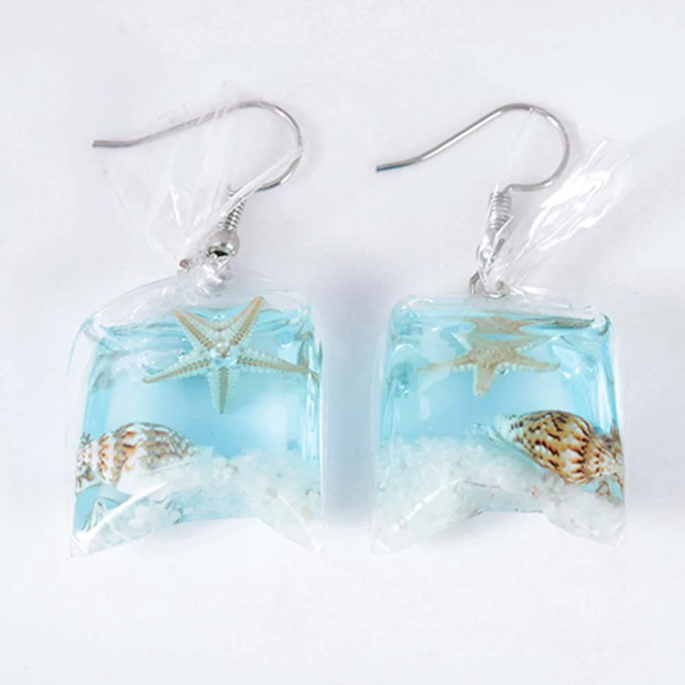 

1Pair Plant Drop Earrings Creative Transparent Candy Marine Wind Conch Earrings Female Personality Resin Dried Flower Jewelry