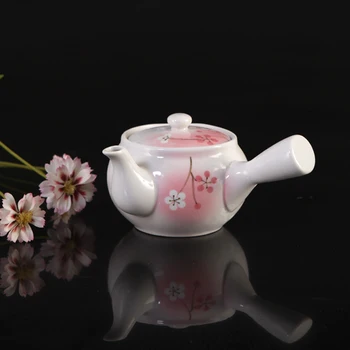 

Japanese ceramic large capacity handmade kungfu teapot with handle flower tea making single side plum blossom pot pink teaware