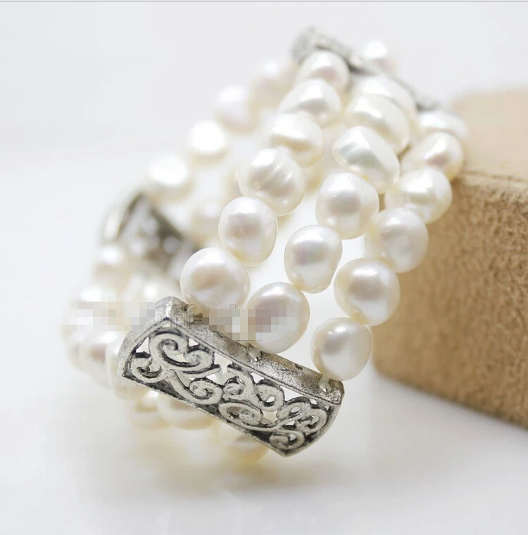 

Free shipping >>>>>>FASHION JEWELRY WHOLESALE WHITE BAROQUE PEARL BRACELET TIBET STYLE