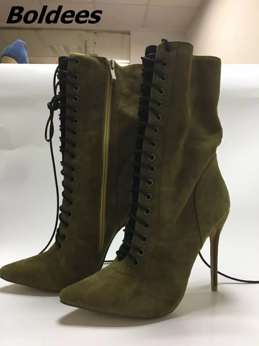 green cross ankle boots