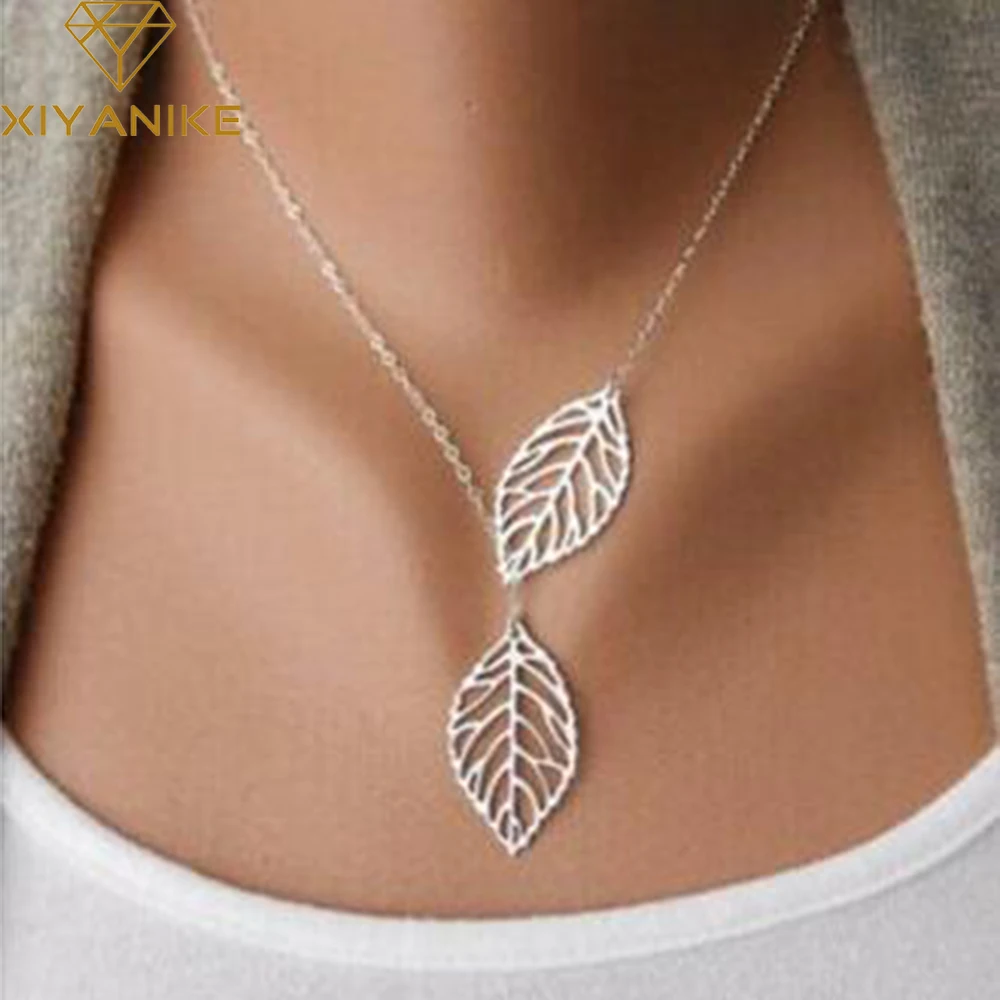 

Simple European New Fashion Vintage Punk Gold Hollow Two Leaf Leaves Pendant Necklace Clavicle Chain Charm Jewelry Women XY-N307