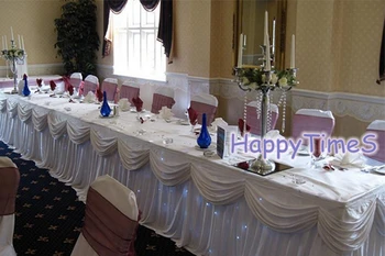 

Wedding Decoration 2pcs/lot 6m*75cm Ice Silk Fabric Table Skirt With White Swag&Metal Clips