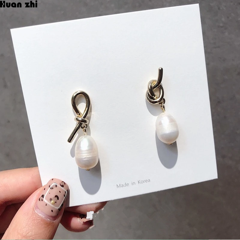 

HUANZHI Korean S925 Sterling Silver Pin Metal Knot Tie Natural Irregular Freshwater Pearl Asymmetric Earrings for Women Girl