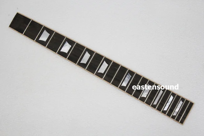 

Electric ebony fingerboard real mother of pearl with nibs on the frets