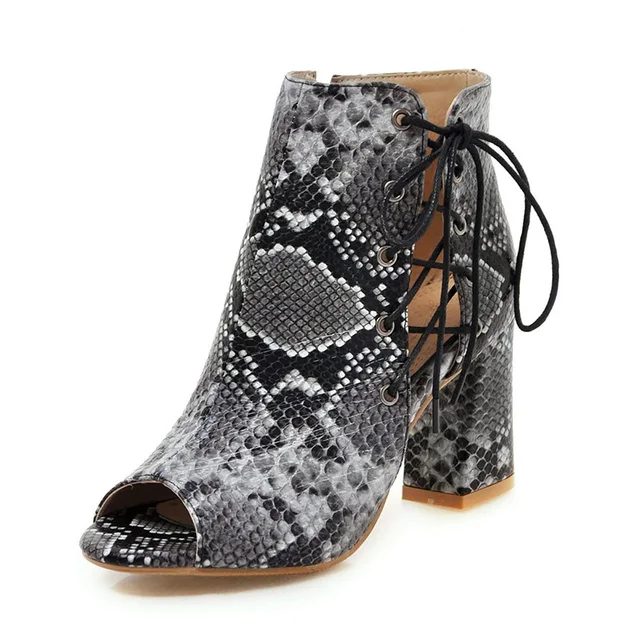 snakeskin heels with black dress