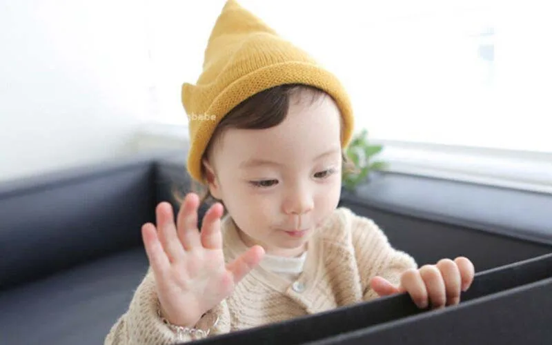 1 шт. корейской моды Прекрасный elfin дети трикотажные шапки осень-зима маленьких Утепленная одежда Шапки для девочек и мальчиков 7 цветов 8480