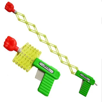 

Kids Moving Toy Funny Telescopic Fist Gun Strange Toys Toy Stretch Fist Shot toy manufacturer