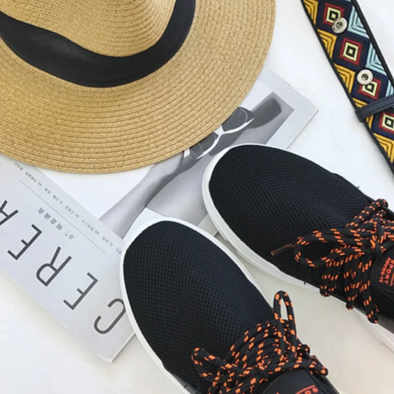 

New cowhide knit casual shoes female students wild air cushion breathable flying woven mesh shoes