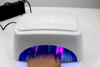 

Free Shipping 110V - 240V White HD60 60W CCFL LED UV GEl Polish Lamp Gel Curing Nail Dryer with Timer, Sensor, Voltage Adapter