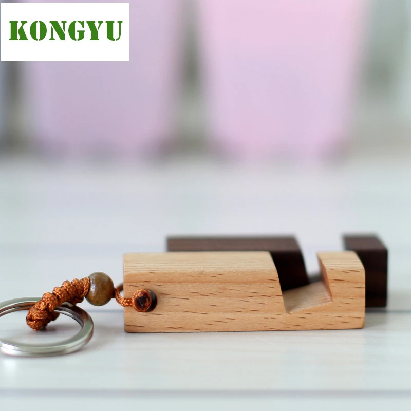 Kongyu Holz Handyhalter Personlichkeit Holz Handy Halter Schlusselanhanger Stehen Nussbaum Telefon Halterung 2 Farben Geschenke Key Ring Stand Phone Bracketmobile Phone Holder Aliexpress